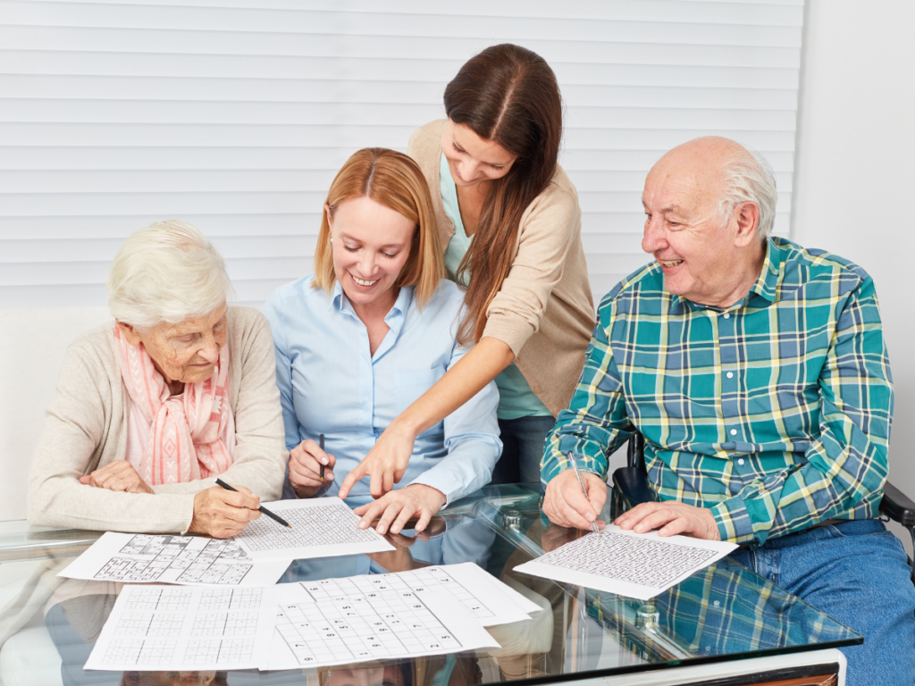Multigenerational family enjoying printable puzzle games together, highlighting face-to-face communication, bonding, and memory-building through shared screen-free activities.