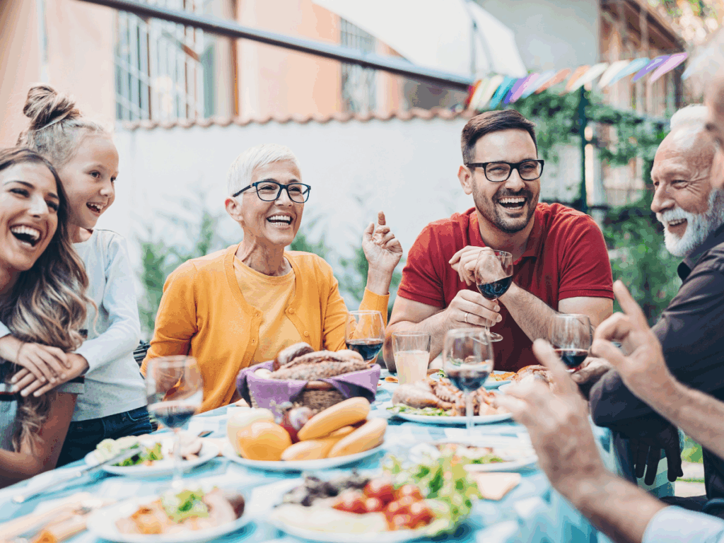 Happy family having dinner together, time for a printable games bundle